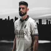 Camisa AC Milan X PLEASURES 2024/25 Torcedor Puma Masculina - Bege